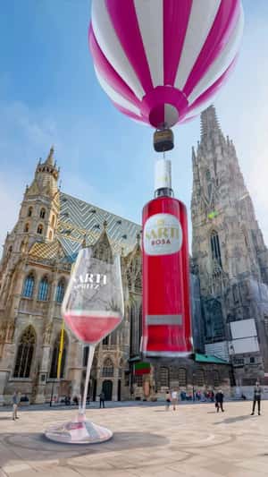 Hot Air Balloon Cocktail Drink Delivery in a fake-out-of-home ad of SARTI