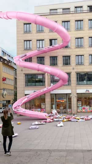 Beauty Essentials On Water Park Slide in fake-out-of-home ad of DM