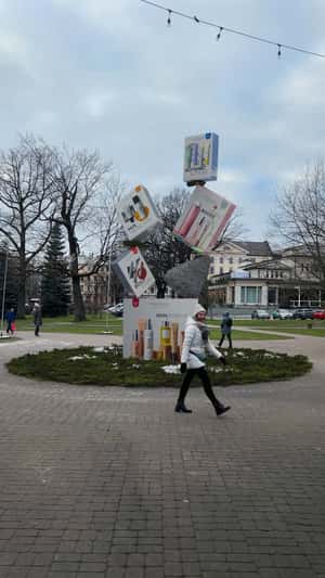 Stacked Product Boxes Balancing in a fake-out-of-home ad of MÁDARA