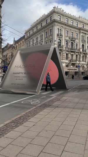Blush Compact Canopy on Pedestrian Lane in a fake-out-of-home-ad of MÁDARA