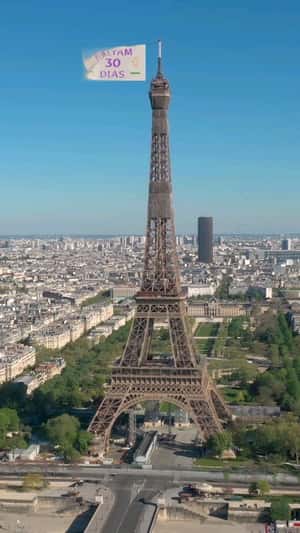 Purple Fuzzy Inflatables Bumps onto Eiffel Tower in a fake-out-of-home-ad of Vivo