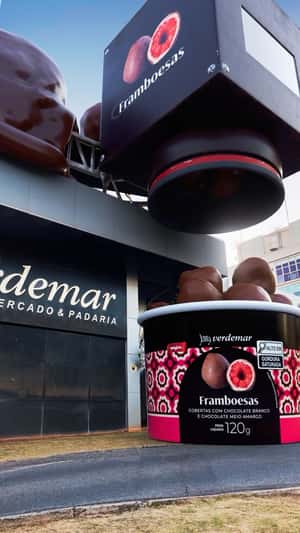 Chocolate-Coating Raspberry Machine in a fake-out-of-home ad of Verdemar