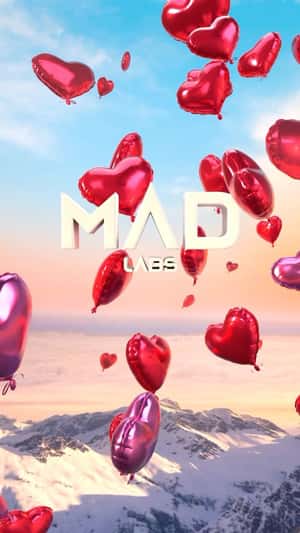 Heart Balloons Float Above Snowy Mountains in a fake-out-of-home ad of MAD Labs