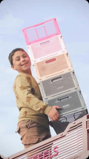 Stack Boxes Towering at the Square in a fake-out-of-home ad of HEMA