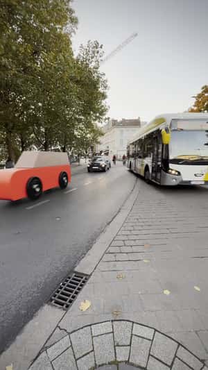 Wooden Toy Cars Driving in a fake-out-of-home ad of HEMA
