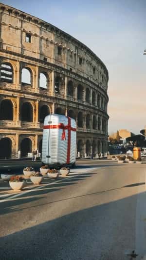 Suitcases Drives Near The Colosseum in a fake-out-of-home ad of Samsonite