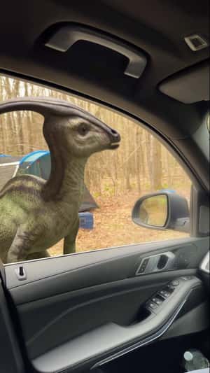 Dinosaurs Appear in Front of the Car in a fake-out-of-home ad of Netflix