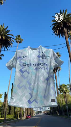 Jerseys Hanging in Palm Trees in a fake-out-of-home ad of Inter
