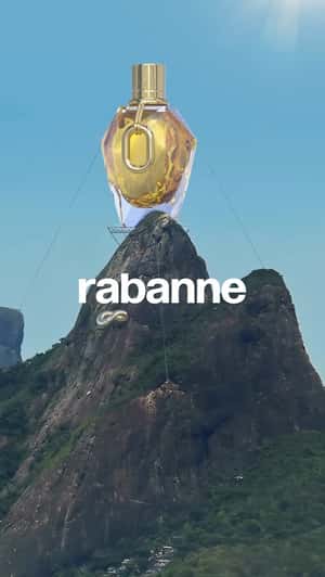 Perfume Monument Above Mountain in a fake-out-of-home ad of Rabanne