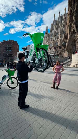 E-bike Rolls in Front of Sagrada Familia in a fake-out-of-home ad of Lime
