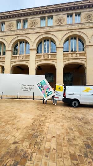 Crews Put Post Stamp on Envelope in a fake-out-of-home ad of La Poste