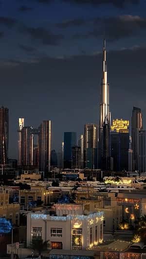 Crescent and Star Lights Hang on Windows in a fake-out-of-home ad of BrandDubai