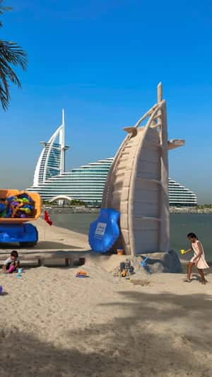 Toy Truck Dumps Toy Guns at Beach in a fake-out-of-home ad of BrandDubai