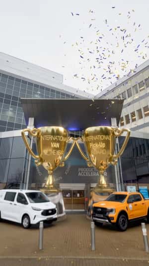 Golden Trophies Unveiled at Ford Building in a fake-out-of-home ad of Ford