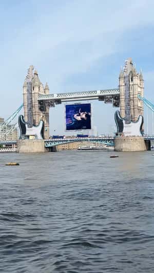 Electric Guitars on Tower Bridge in a fake-out-of-home ad of Lenny Kravitz