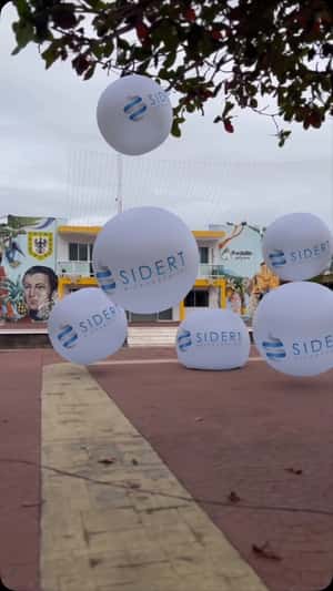 Brand Spheres Bouncing on the Street in a fake-out-of-home ad of SIDERT