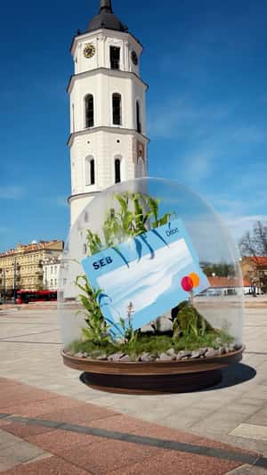 Debit Card in Terrarium Rotates at Square in a fake-out-of-home ad of SEB
