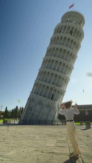 Vacuum Cleaner Straightens Leaning Tower in a fake-out-of-home ad of Samsung