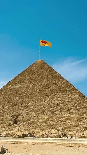 Logo Banner Waves Above Pyramid in a fake-out-of-home ad of Superman