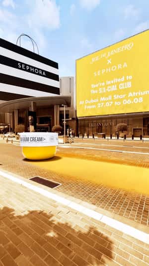 Moving Cream Leaves Yellow Trail in a fake-out-of-home ad of Sephora
