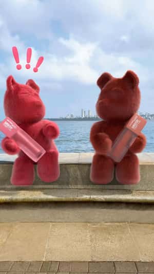 Teddy Bears Holding Lip Tint in a fake-out-of-hand of Maybelline