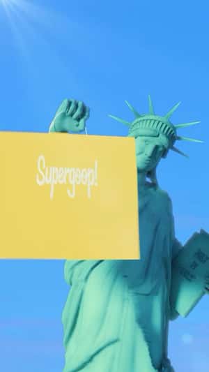 Statue of Liberty Holding Shopping Bag in a fake-out-of-home ad of Nykaa