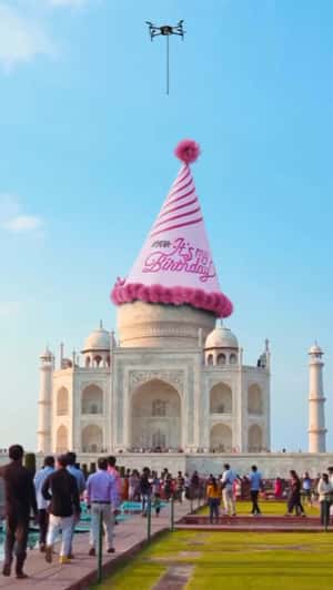 Landmarks Wearing Party Hats in a fake-out-of-home ad of Nykaa