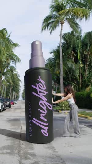 Bottle Spray Stuck on Street in a fake-out-of-home ad of Urban Decay