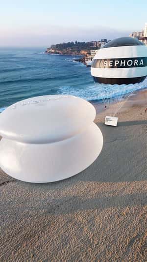 Sculpt Cup Inflates at Beach in a fake-out-of-home ad of BIOTYSPA