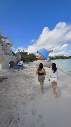 Rubber Ducky Sand Sculpture in a fake-out-of-home ad of Carnival Cruise