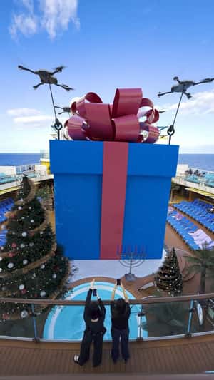 Sandcastle Unboxing at Ship in a fake-out-of-home ad of Carnival Cruise