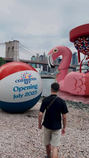 Beach Balls Dripping on Hourglass in a fake-out-of-home ad of Carnival Cruise