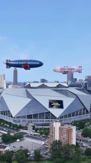Team Airship Hovers Above Stadium in a fake-out-of-home ad of Paris Saint-Germain