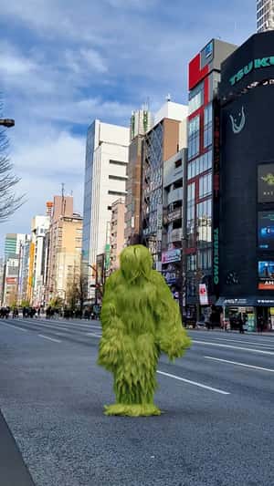 Green Furry Mascot in fake-out-of-home ad of Zara