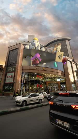 Shopping Goods Emerge from Screen in a fake-out-of-home ad of Palladium