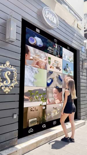 Window Transformed into Interactive Screen in a fake-out-of-home ad of SABON