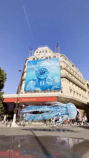 Jelly Fish Swims Above Street in a fake-out-of-home ad of Galeries Lafayette 