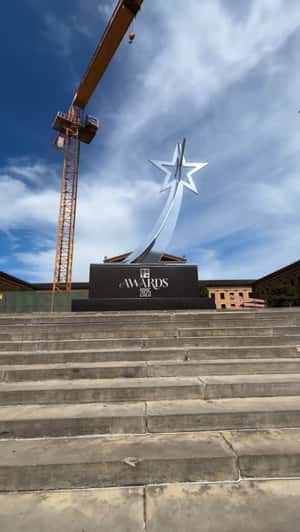 Crane Drops Trophy at Landmark in a fake-out-of-home ad of BET