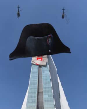 Helicopters Drop Hat on Tower in a fake-out-of-home ad of Sony Pictures
