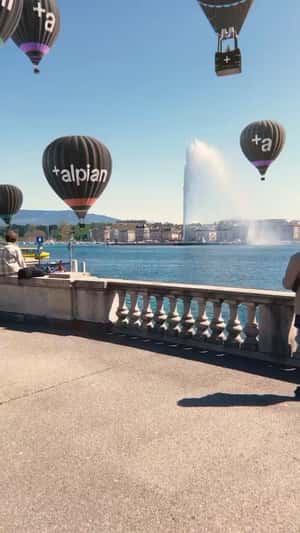 ot Air Balloons on Lake Geneva in a fake-out-of-home ad of Alpian Bank