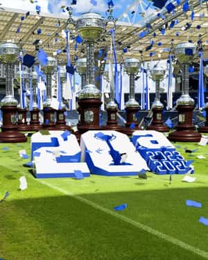Tropies Displayed on Stadium Field in a fake-out-of-home ad of FC Porto