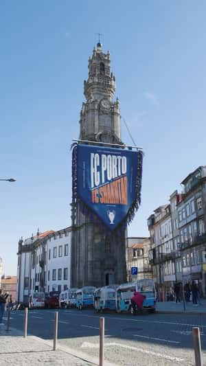 Banner Waves at Church Tower in a fake-out-of-home ad of FC Porto