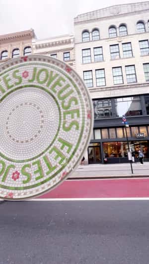 Rolling Tile Plate on the Street in a fake-out-of-home ad of Anthropologie