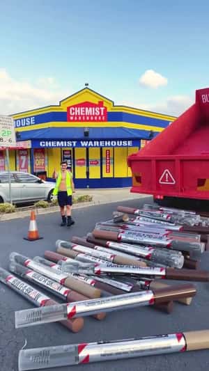 Oversized Brow pens loading of truck fake out of home ad of maybelline