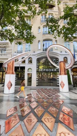Giant Tint Ring Light in fake-out-of-home ad of Charlotte Tilbury