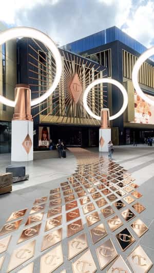 Tint Ring Light Post in fake-out-of-home ad of Charlotte Tilbury