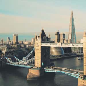 Welcome Banner Unfurls at Tower Bridge in a fake-out-of-home ad of Beefeater Gin
