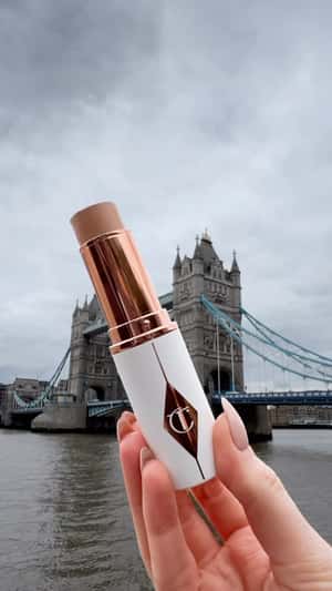 Tint Tower Bridge in fake-out-of-home ad of Charlotte Tilbury