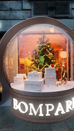 Christmas Snowball Display at Store in a fake-out-of-home ad of Bompard
