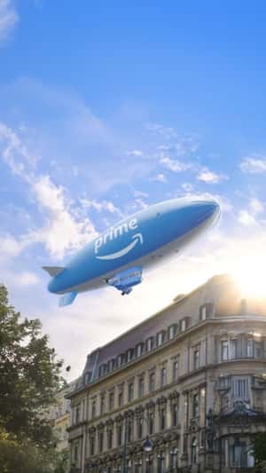 Prime Airship Glides Above Buildings in a fake-out-of-home ad of Amazon
